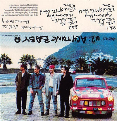 U2 and their Trabant car at Las Teresitas beach in Tenerife in February 1991